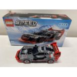 A Lego Speed Champions Audi S1 E-Tron Quattro model 76921, with original box etc, shipping