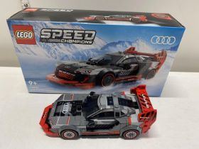 A Lego Speed Champions Audi S1 E-Tron Quattro model 76921, with original box etc, shipping