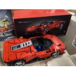 A Lego Technic Ferrari Daytona SP3 model 42143, with original box etc, shipping unavailable