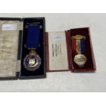 A hallmarked silver Buffalo medal with one other gilt Buffalo medal