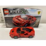 A Lego Speed Champions Ferrari F8 Tributo model 76895, with original box etc, shipping unavailable