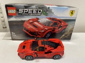 A Lego Speed Champions Ferrari F8 Tributo model 76895, with original box etc, shipping unavailable