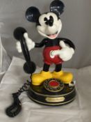 A vintage novelty Mickey Mouse telephone h38cm.