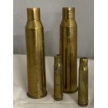 Four WW2 period brass shell casings