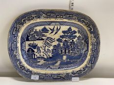 A large Victorian blue and white willow pattern meat plate, 46x37cm, shipping unavailable