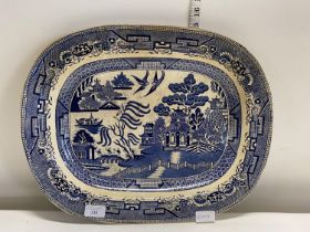 A large Victorian blue and white willow pattern meat plate, 46x37cm, shipping unavailable