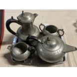 A vintage Sheffield Pewter for piece tea set on a stainless steel tray
