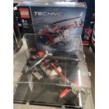 A Lego Technic Rescue Helicopter model 42092 in display case, with original box etc, shipping