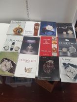 A large selection of Christies auction catalogues all relating to time pieces, shipping unavailable
