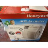 A boxed Honeywell HEPA air cleaner (untested), shipping available
