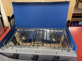 A camping stove (untested).Shipping unavailable