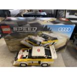 A Lego Speed Champions 1985 Audi Sport Quattro model 76897, with original box etc, shipping