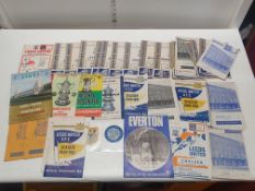 A good selection of vintage Leeds United ephemera to include programmes, scarf & patches etc. From