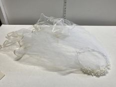 A boxed Gibbons wedding veil