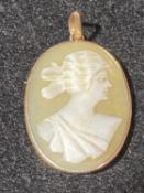 A tests for 9ct gold cameo locket. Gross weight 2.51 grams