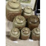 A selection of Mid Century ceramic kitchen storage jars. shipping unavailable
