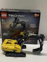 A Lego Technic Heavy Duty Excavator 42121, with original box etc, shipping unavailable