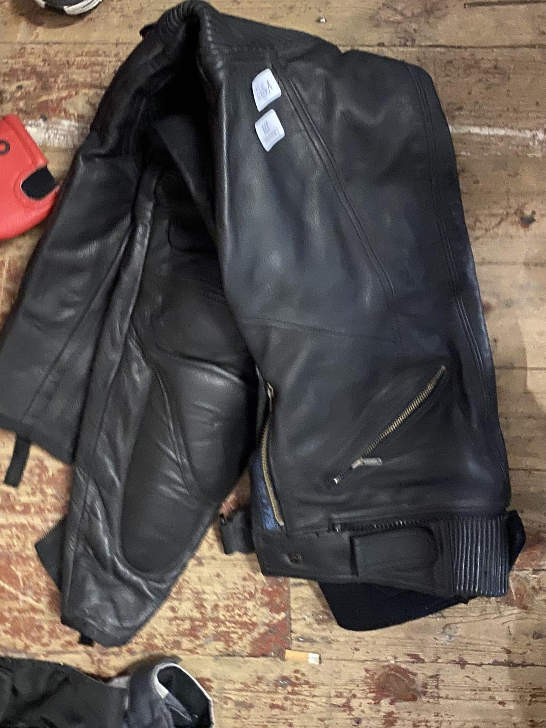 A pair of Look Well leather motorbike trousers size 28S