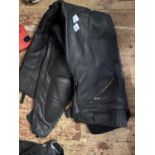 A pair of Look Well leather motorbike trousers size 28S