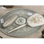 A vintage Ladies dressing table set with needle point decoration
