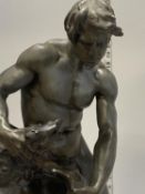 A antique French spelter sculpture with a bronze flush by the French artist Anatole Guillot 1865 -