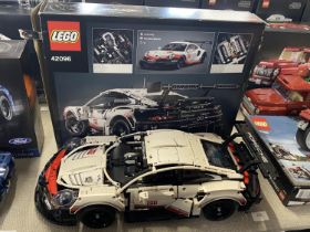 A Lego Technic Porsche 911 RSR model 42096, with original box etc, shipping unavailable