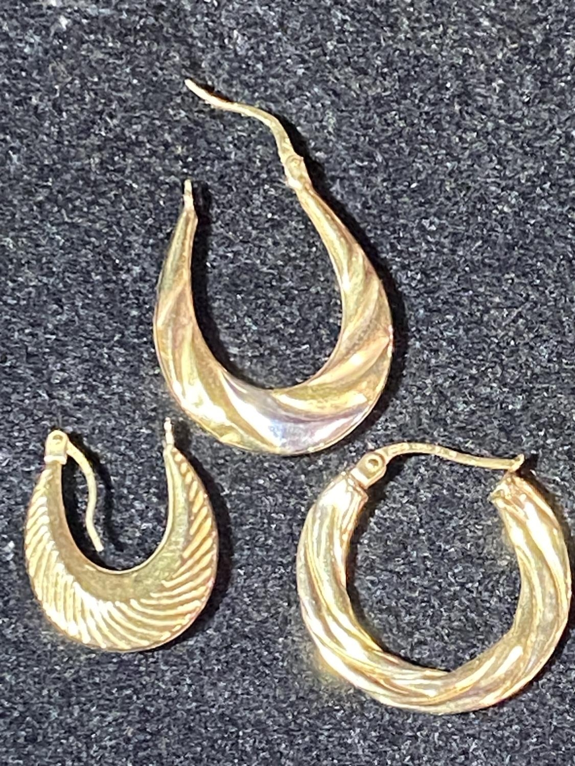 Three 9ct gold earrings for scrap. 1.43 grams.