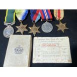 A grouping of WW2 medals & a Territorial efficiency medal awarded to Craftsman J Stringer Royal