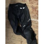 A pair of RST motorbike trousers size 14