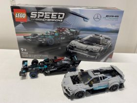 A Lego Speed Champions Mercedes AMG F1 W12E Performance & Mercedes AMG model 76909, with original