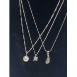 Three 925 silver chains and pendants