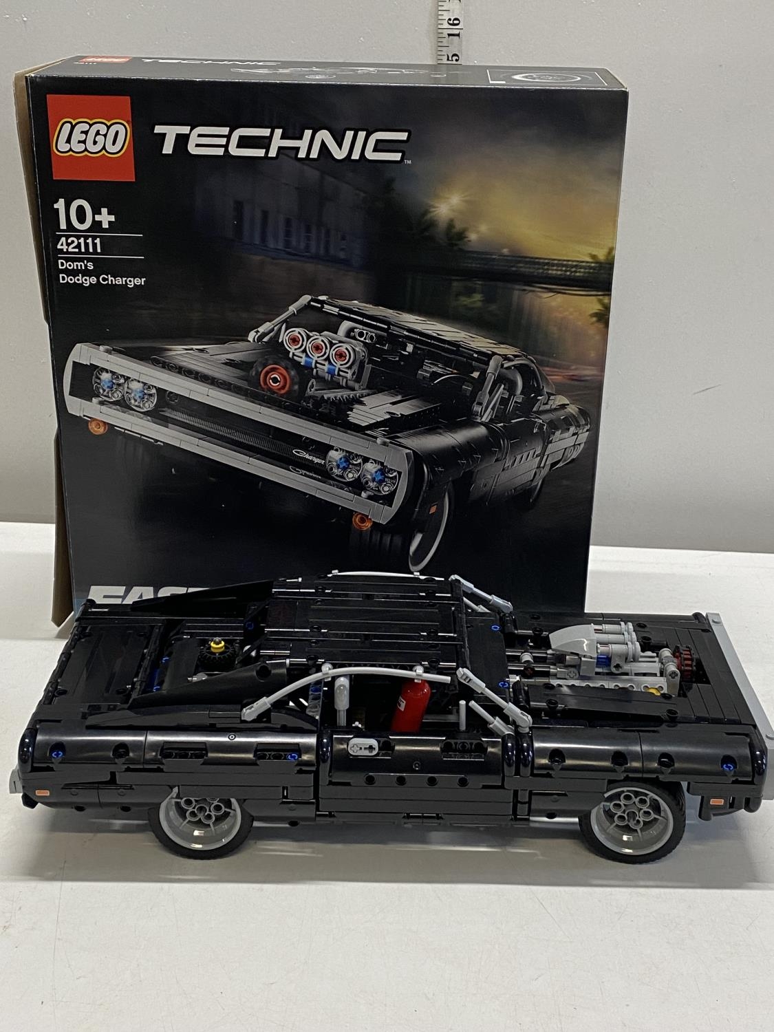 A Lego Technic Fast & Furious Dom's Dodge Charger model 42111, with original box etc, shipping