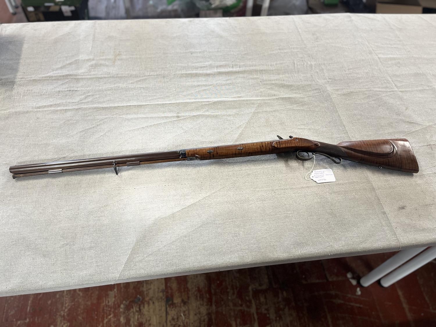 A Pedersoli & Mortimer flintlock single shot shotgun. Black powder only. Serial number 49996.