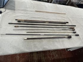 A job lot of rifle and shot gun cleaning rods etc, shipping unavailable