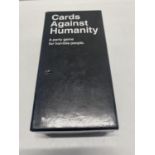 A boxed set of Cards Against Humanity (unchecked)