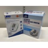 Two boxed blood pressure monitors (untested)