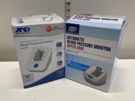 Two boxed blood pressure monitors (untested)