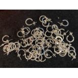 A job lot of new white metal earrings