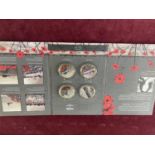 A cased set of four Royal Poppy Collection coins by Jacqueline Hurley