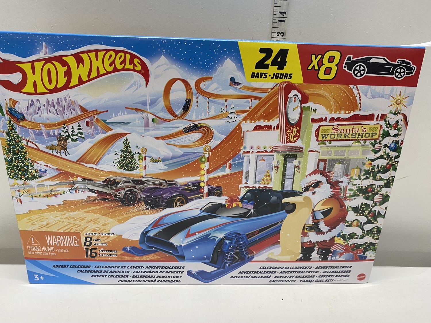 A boxed Hot Wheels advent calendar (8 cars and 16 accessories)