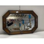 A vintage 1930's oak framed bevelled edge mirror 70x47cm. Shipping unavailable