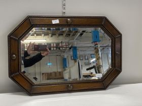 A vintage 1930's oak framed bevelled edge mirror 70x47cm. Shipping unavailable