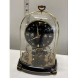 A vintage Schatz mantle clock, shipping unavailable