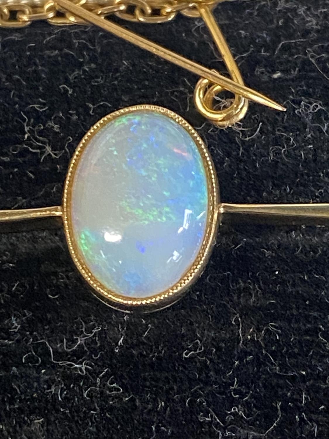 A 14ct gold and opal bar brooch in original box 4.10g - Image 2 of 2