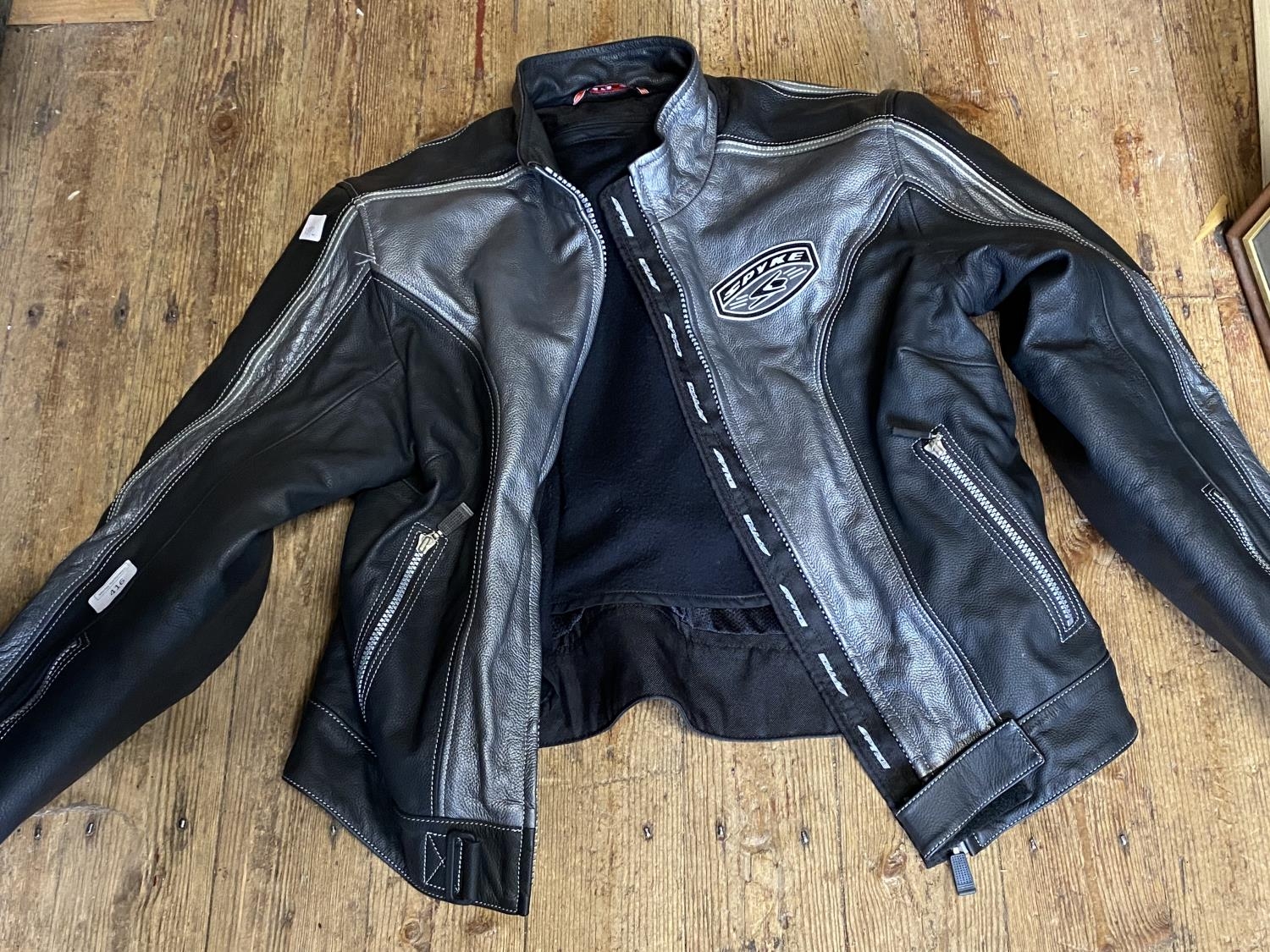 A Spyke motorbike jacket size unknown