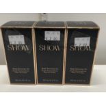 Three boxed Show body shimmer oils