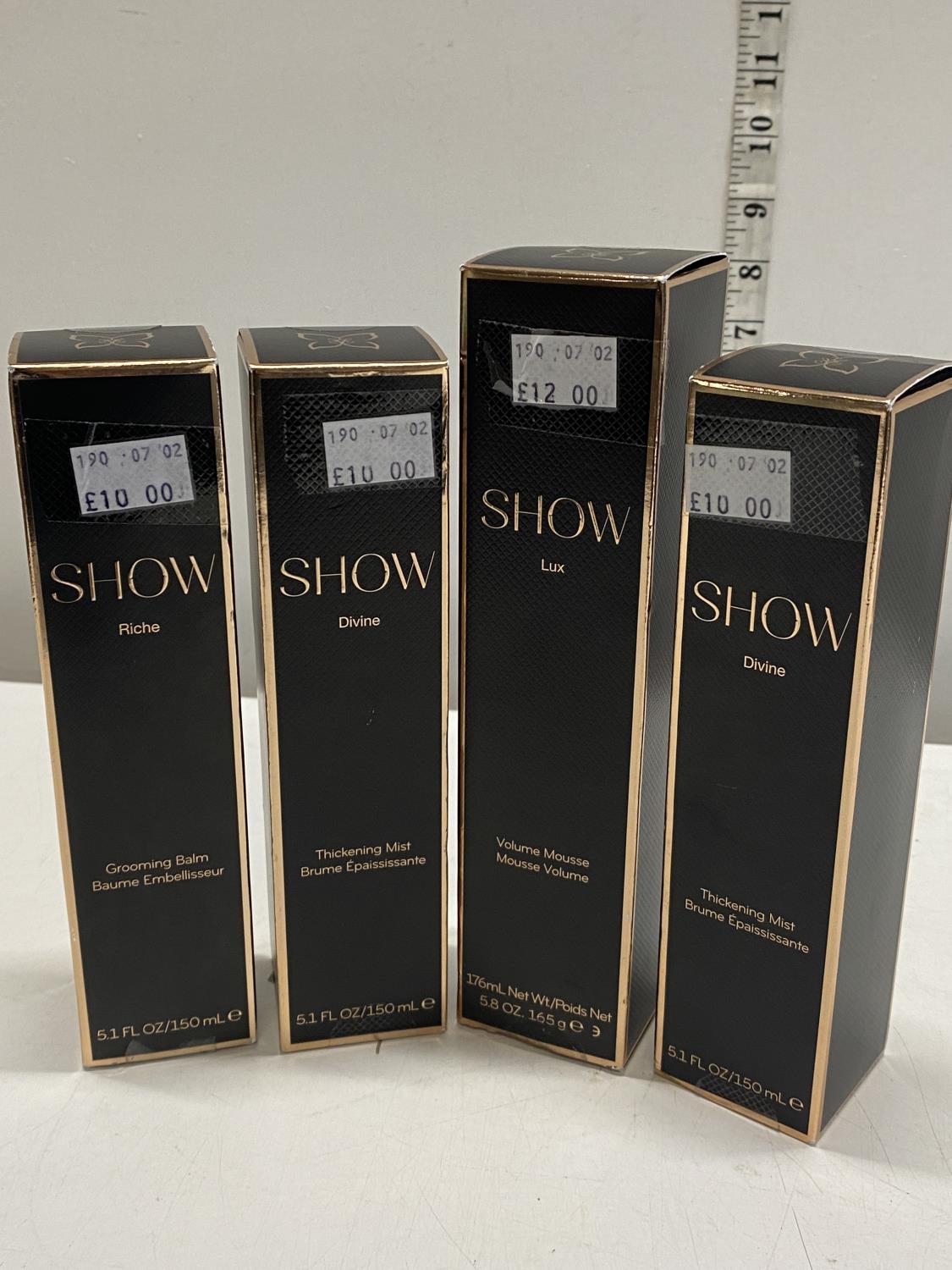 Four boxed assorted Show beauty products