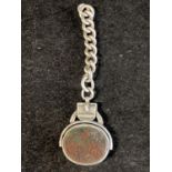 A hallmarked silver spinning fob on chain