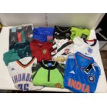 A job lot of assorted size football shirts (unauthenticated)