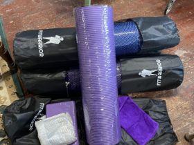 Four new Fitwarrior yoga mat kits including mat, skipping rope towel and foam brick, shipping